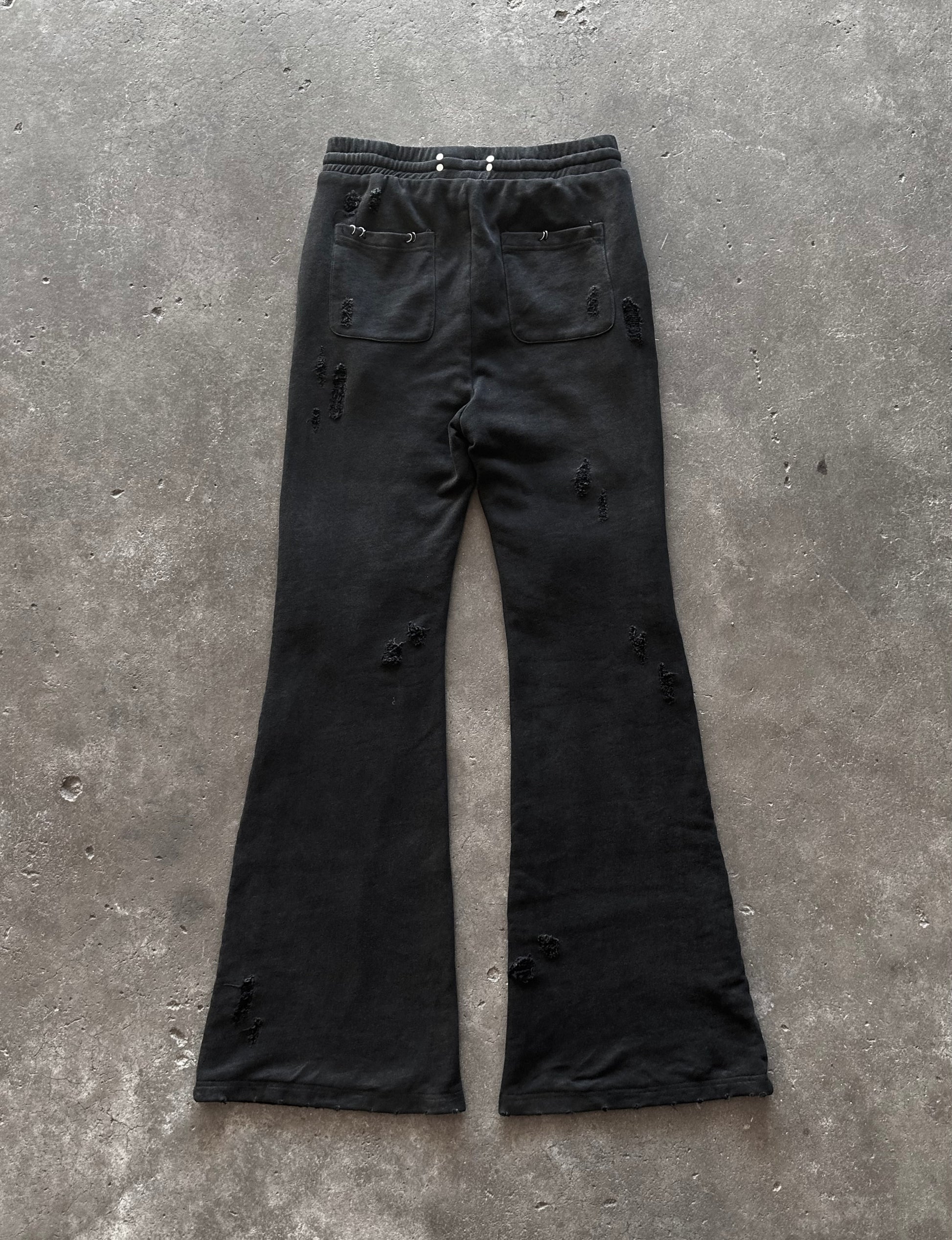 PIERCED DISTRESSED SWEATPANTS